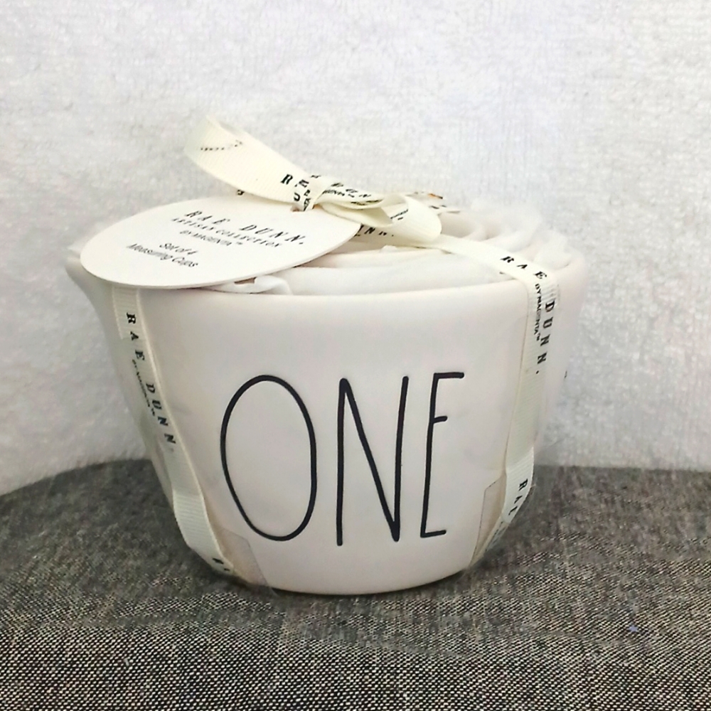 White matte ceramic measuring cups by Rae Dunn